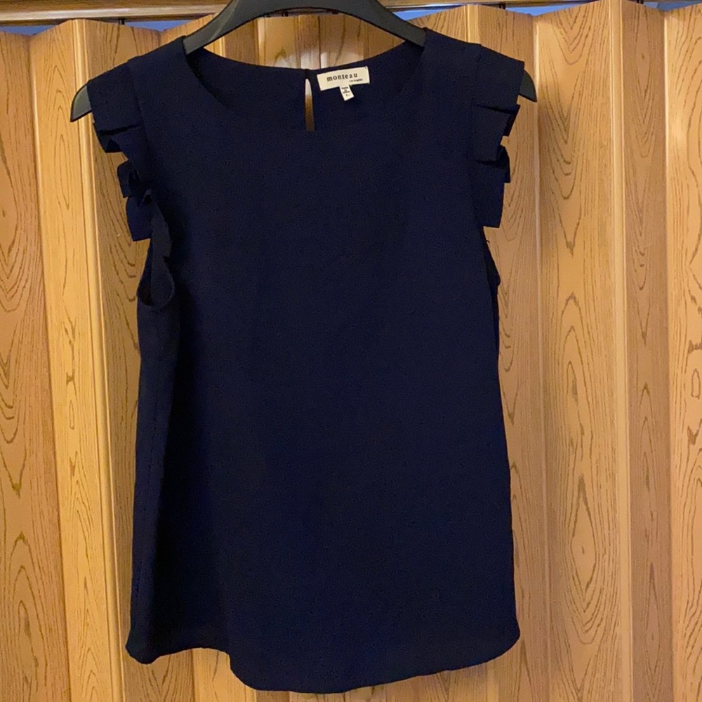 Gently used tank top with ruffle sleeves